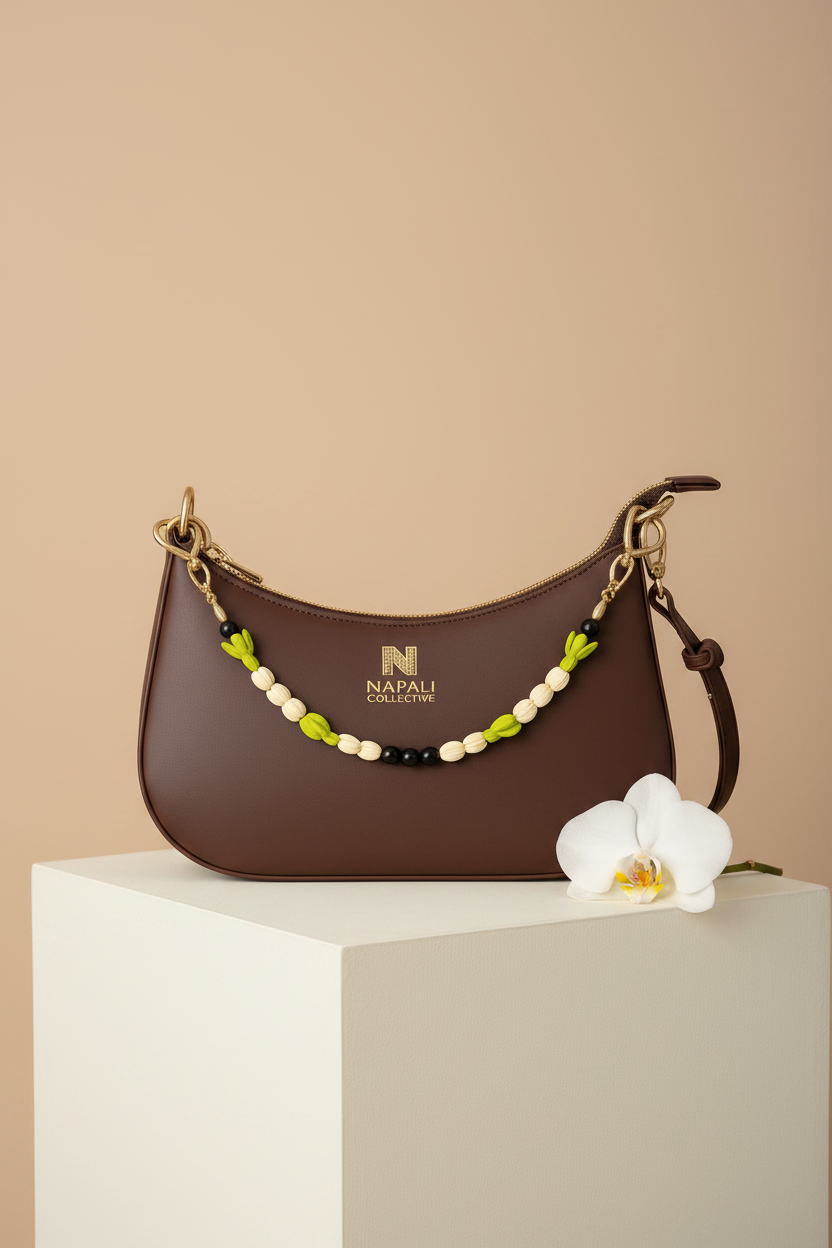 Nāpali Collective Bag on Studio Pedestal with Orchid